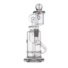 The MJ Arsenal Ursa Mini Dab Rig features durable borosilicate glass, a cylindrical base, bent neck, attached chamber, glass handle, and a round removable top. Shown against a white background.