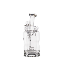 The MJ Arsenal Turbine Mini Dab Rig is a clear borosilicate glass water pipe with multiple chambers, angled cylindrical stems, and an Inception Turbine Perc, shown on a white background.