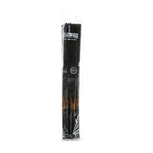 A clear zip top bag holds a bundle of Wild Berry Incense Sticks. White branding decorates the top, while the black sticks with brown tips are visible through the plastic packaging.
