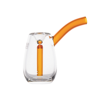 The MJ Arsenal Bulb Bubbler is a clear borosilicate glass mini bubbler pipe with an orange angled mouthpiece and inner downstem, offering portability and style in a compact design, shown on a white background.