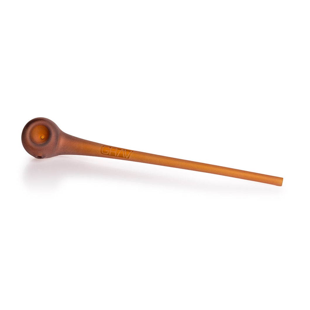 The Grav Sandblasted Gandalf is a frosted orange glass smoking pipe with a round bowl, long straight stem, and matte finish, resembling an elegant Gandalf style, displayed on a white background.