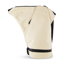 The Puffco Journey Bag, featuring a beige oven mitt with a black wrist strap, protects hands from heat when handling your Peak Pro or its accessories. The mitt is shown standing upright against a white background.
