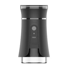 The Yocan iShred Electric Grinder is a black, cylindrical grinder with a transparent bottom, central button, and "Yocan" branding. Its sleek design features modern Type-C charging for added convenience.