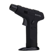 The black Maven Strength Torch (Unfilled) features a trigger, safety lock, and base stand. Butane refillable and ideal as a torch lighter, it's shown against a plain white background.