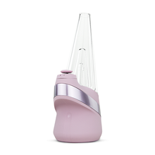 The New Peak Vaporizer is a modern pink and silver tabletop device with a transparent, cone-shaped glass top and advanced 3D Chamber, photographed on a white background.