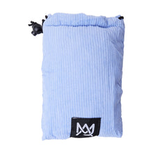 The MJ Arsenal Padded Drawstring Pouch is light blue with a ribbed design and a black and white logo patch at the bottom center—ideal for storing glass accessories, shown on a plain white background.