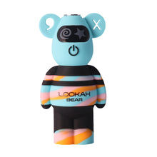 The Lookah Bear 510 Thread Battery is a colorful, bear-shaped silicone vape with blue ears, black and pastel striped body, X and spiral shapes on its face, "LOOKAH BEAR" on its chest, and a built-in 500mAh battery.
