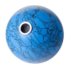 The Astral Project Globe Pipe is a round, blue pipe with black veining like turquoise and a metal-rimmed circular opening, shown against a white background.