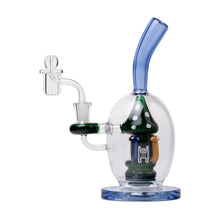 The Human Grade Mushroom Globe Glass Rig features clear borosilicate glass, a blue-tinted mouthpiece, round base, internal green mushroom design, side arm, glass bowl attachment, and is 14mm quartz bucket compatible.