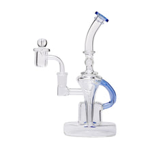 The Dualing Recycler Glass Rig Water Pipe is a clear borosilicate rig with a curved neck, blue accents, round base, 14mm joint, quartz banger, and bubble carb cap—expertly designed for vaporizing concentrates.