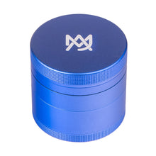 The MJ Arsenal 4 Piece Grinder is a blue cylindrical aluminum grinder featuring textured grip bands and a white geometric logo on the lid, shown against a white background.