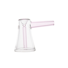 The MJ Arsenal Vulkan Bubbler is a compact, clear borosilicate glass bubbler featuring a conical shape and a short, pink-tinted spout extending from one side, shown against a white background.