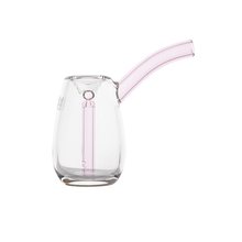 The MJ Arsenal Bulb Bubbler is a clear borosilicate glass pitcher featuring a curved light pink spout and an internal vertical glass tube, photographed on a white background.