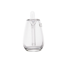 The MJ Arsenal Bulb Bubbler is a clear borosilicate glass pitcher with a rounded body and vertical spout, photographed against a plain white background.