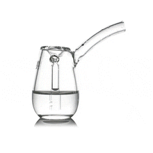The MJ Arsenal Bulb Bubbler, made from transparent borosilicate glass with a long spout, is shown being filled with water and used to pour out liquid, all set against a white background.