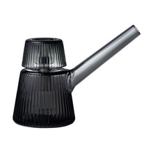 The NWTN Home Deco Bubbler is a modern black teapot made of ribbed borosilicate glass, featuring a tall angled spout and matching lid, shown against a white background.