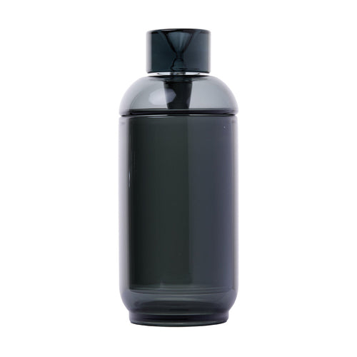 The NWTN Home Vesper Gravity Pipe is a modern, dark gray borosilicate glass bottle with a cylindrical shape and rounded matching lid. Photographed on white, it features a versatile 14mm connection.