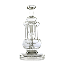 The MJ Arsenal Claude Mini Dab Rig is a clear glass piece with intricate, looping shapes and a round base, perfect for those who appreciate abstract modern art design in their smoking accessories.
