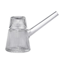 The NWTN Home Deco Bubbler is a clear ribbed borosilicate glass cezve (Turkish coffee pot) with a straight handle and matching lid featuring vertical textures, reminiscent of Art Deco glassware, shown on a white background.