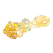 The Red Eye Glass 5" Middle Man Pipe is a translucent yellow borosilicate glass hand pipe with decorative bubble-like accents on the bowl and stem, displayed against a white background.