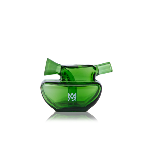 The MJ Arsenal Commander Blunt Bubbler is a modern green borosilicate glass pipe featuring a unique angular design and a white geometric logo on the front, displayed against a white background.
