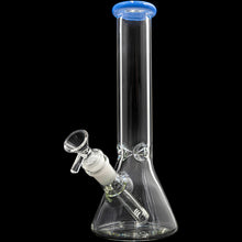 The Glassic Beaker Bong with Color Lip is a 10" clear glass water pipe featuring a beaker base, cylindrical neck, blue-rimmed mouthpiece, and angled downstem with bowl, shown against a black background.