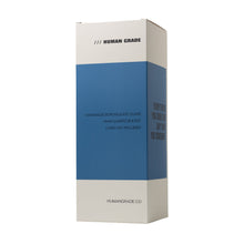 A blue and white rectangular box labeled HUMAN GRADE displays the 11.5" Swiss Incycler Glass Water Pipe, handmade from borosilicate glass with a 14mm quartz bucket and carb cap included. HUMANGRADE.CO is shown at the bottom.