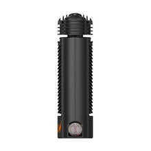 The Storz & Bickel Crafty+ Vaporizer USB-C Charger is a black handheld device with vertical ridges and a circular top with fin-like details, plus a silver and orange logo at the base. It works with S&B accessories and supports USB-C charging. Displayed on white.