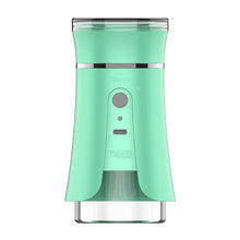 The Yocan iShred Electric Grinder is a teal, cylindrical device with a transparent base, central button, and sleek modern design. It features convenient Type-C charging for easy power-up.