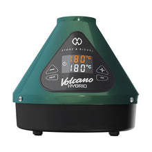A green and black Storz & Bickel Volcano Hybrid features a digital display at 180°C, heat and air buttons, the brand logo above the screen, and an Easy Valve Balloon attachment for convenient vapor delivery.