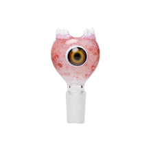 The Human Grade Novelty Bowl, featuring a bloodshot eyeball with pink veins, a yellow-black iris, and tooth-like accents, adds quirky flair to any 14mm water pipe. Available individually or in a pack of 3; includes a clear cylindrical base for easy use.
