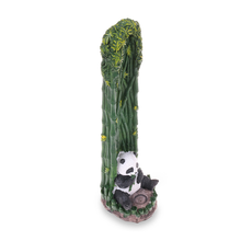 A Fantasy Tower Incense Burners piece features a small hand-painted resin panda figurine sitting and eating bamboo at the base of tall green bamboo stalks.