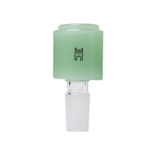 The Human Grade Novelty Bowl is a green, cylindrical glass bowl with a frosted base, smooth opaque top, and small dark logo—designed for 14mm water pipes. Available individually or in packs of 3 for those seeking unique novelty bowls.