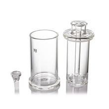 Three clean, empty borosilicate glass parts—a small bowl, a cylindrical chamber, and a larger chamber with top and inner percolator—are shown on a white background, ideal for setups such as the MJ Arsenal Piston Gravity Bong.