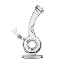 The MJ Arsenal Saturn Water Pipe is a compact rig made from durable borosilicate glass, featuring a clear round base, angled neck, and convenient side bowl attachment for smooth smoking sessions.