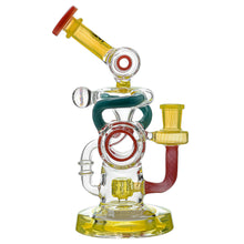 The Calibear Loopsicle Recycler Dab Rig is a colorful borosilicate glass water pipe with red, yellow, and green accents, multi-loop recycler design with twisting tubes, rounded base, and unique circular and cylindrical elements.