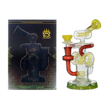 The Calibear Loopsicle Recycler Dab Rig, made of clear and yellow borosilicate glass with red accents, is shown beside its black and gold box featuring the rig’s outline and the Calibear bear paw logo.