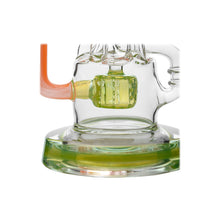 Close-up of the Calibear Gusher Recycler Dual Percolator Dab Rig, showcasing a green-tinted base, orange side tube, and intricate transparent glasswork.