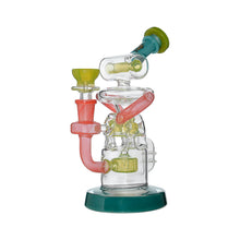 The Calibear Gusher Recycler Dual Percolator Dab Rig features green, pink, and yellow accents with an elaborate design and wide green base, shown against a white background.