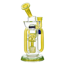 The Calibear Supercycler Recycler Dab Rig is a glass water pipe with yellow and green accents, a cylindrical body, side handles, an angled mouthpiece, and a dual percolator recycler system for smoother smoking or vaporizing.