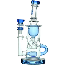 The Calibear Cascade Flower Of Life Klein Recycler Dab Rig is a clear glass piece with blue accents, a cylindrical chamber, side handle, 14mm female joint, Flower of Life percolator, bowl, and mouthpiece for smooth filtering and smoking.