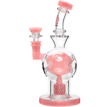 The Calibear Exosphere Seed Of Life Dab Rig features clear borosilicate glass with pink accents on the mouthpiece, bowl, joint, and base, plus an interior Seed of Life percolator for smooth smoking sessions.