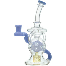 The Calibear Infinity Loop Seed Of Life Klein Recycler is a clear borosilicate glass water pipe with blue accents, circular indents on its spherical chamber, and a gold-colored Seed of Life percolator for smooth filtration.