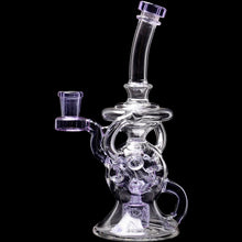 The Calibear Infinity Loop Seed Of Life Klein Recycler is a clear borosilicate glass water pipe with purple accents, an artistic curved neck, and a Seed of Life percolator, shown against a black background.
