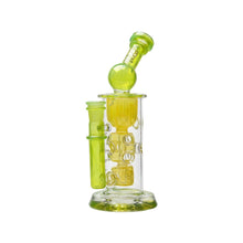 The Calibear Seed Of Life Swiss Incycler Dab Rig, a small transparent glass piece with yellow-green accents, cylindrical chamber, angled mouthpiece, and side tube, is shown on a white background.