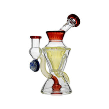 The Calibear Hourglass Marble Adorned Recycler Dab Rig features a unique artistic design with red and yellow accents, intricate curves, and an hourglass side chamber holding a blue element, displayed against a white background.