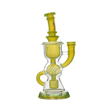 The Calibear Vortex Seed Of Life Recycler Dab Rig is a clear and yellow glass water pipe with a wide base, angled neck, intricate curves, chambered design, and a Seed of Life percolator for superior filtration.