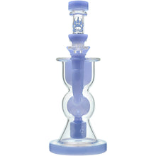 The Calibear Vortex Seed Of Life Recycler Dab Rig is a clear and light purple water pipe with a wide base, hourglass chamber, Seed of Life percolator, and a paw print logo on the neck.