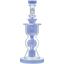 The Calibear Vortex Seed Of Life Recycler Dab Rig is a clear glass water pipe with light purple accents, a paw print logo near the top, and an hourglass-shaped body for smooth filtration.