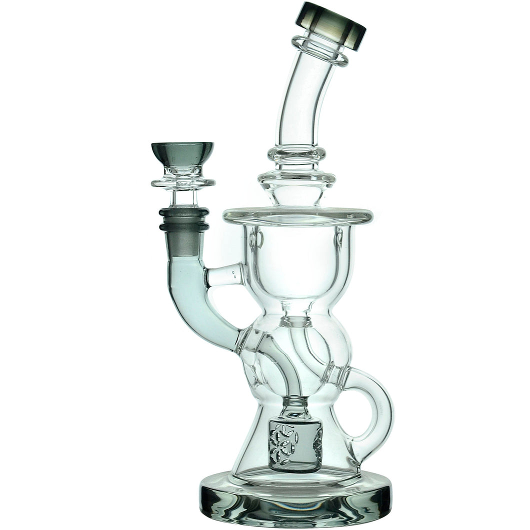 The Calibear Vortex Seed Of Life Recycler Dab Rig is a clear glass water pipe featuring a curved neck, round base, and intricate Seed of Life percolator for superior filtration, shown upright against a white background.